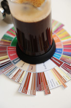 Brewing Black Coffee In French Press. On Coffee Taster's Flavor Wheel. White Background