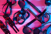 Set Of Erotic Toys For BDSM. The Game Of Sexual Slavery With A Whip, Gag And Leather Blindfold. Intimate Sex Games