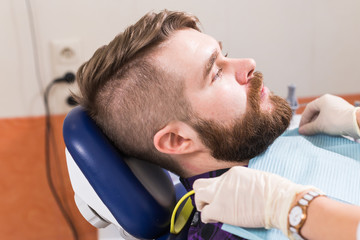 Doctor and patient in the dental clinic. dentistry and dental health concept.