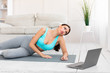 © Prostock-studio - Tired Girl Doing Online Fitness Workout Staying At Home
