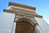 Fototapeta Paryż - Arc de triumph from the bottom in Paris.