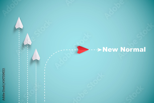 Fotomural Red paper plane out of line with white paper to change disrupt and finding new normal way on blue background