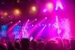 © Kiril - concert a lot of people spotlights purple lights purple