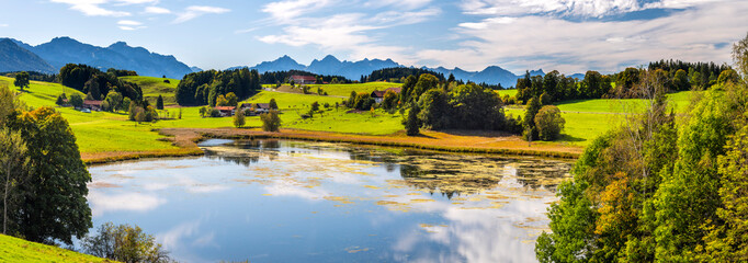 Wall Mural - panoramic landscape with lake and mountains