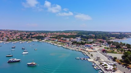 Canvas Print - Aerial view from Medulin town and Medulin marina and boats  under beautiful blue sky with nice white clouds aerial view, Croatia	