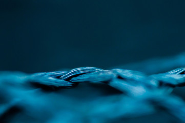 Abstract background of blue texture of nylon fabric on backpack. Abstract photo closeup