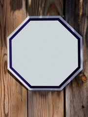 Wall Mural - Blank octagon shaped home security sign mounted on fence. Copy space.