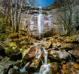 Wall Mural - Waterfall in a forest on mountain. Called Cunguljski waterfall on old mountain (stara planina) in Serbia