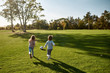 © Svitlana - Children are our most valuable natural resource. Two kids playing with a ball on meadow