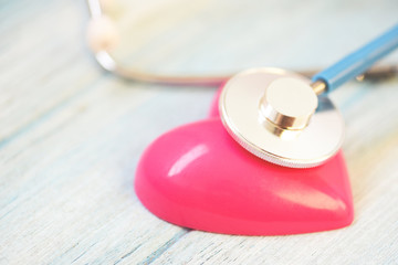 Wall Mural - Heart health and red heart with stethoscope - world heart day world health day or world hypertension day and health insurance concept