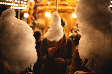 Wall Mural - A cotton candy in front of an ancient German Horse Carousel built in 1896 in Navona Square, Rome, Italy