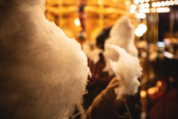 Wall Mural - A cotton candy in front of an ancient German Horse Carousel built in 1896 in Navona Square, Rome, Italy