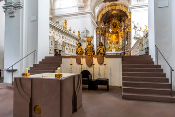 Würzburg, Germany - 10th May 2020: A german photographer visiting the city, taking pictures of the interior of the church Marias chapel.