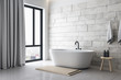 Modern white bathroom with decorative objects and city viwe