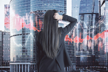 Canvas Print - Pensive woman looking on stock chart