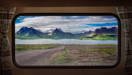 Wall Mural - Mountains at the sea in Iceland, view from camper window