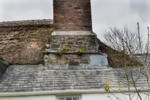 Old Roof And Chimney