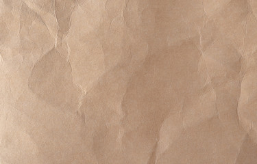 Wall Mural - Brown crumpled paper texture background.