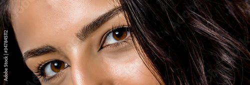 Fotomural close-up photo of woman eye with eyeliner makeup on white background