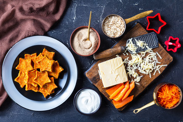 Wall Mural - Carrot Stars cookies on a black plate