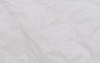 © Lifestyle Graphic - White crumpled paper texture. Abstract paper pattern for background. Close-up.