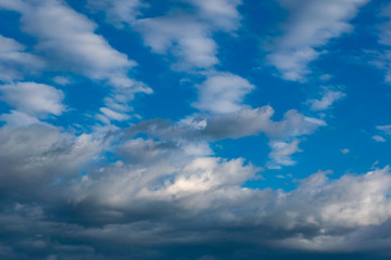 Wall Mural - simple blue sky with white clouds in the cool season, freshness and a clear Sunny day in nature