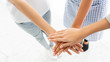 © Rapeepat - Close up portrait group of people putting their hands together. Congratulate Or satisfied that the work was successful. Cooperation in living together in society. Unity of people. Concept teamwork