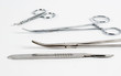 Medical instruments on a white background. Selective focus