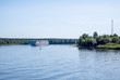 Svir river, Russia - 19 July 2019: Passenger ship cruising on the Svir River.