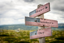 Happy Presidents Day Text On Wooden American Flag Signpost Outdoors In Nature.