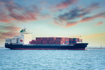 Aerial view by drone container ship and  boat going to sea port for logistics shipping