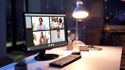 Sticker - virtual communication and technology concept - group video chat windows on computer at night office