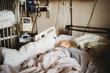 © Cavan Images - Baby at the hospital sick with a virus coronavirus covid19