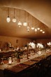 © Gustavo Pozo/ADDICTIVE STOCK - Traditional vintage interior of restaurant in Marrakesh city with long decorated tables and antique lamps hanging under ceiling