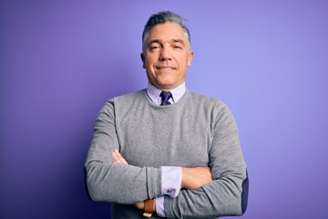 Wall Mural - Middle age handsome grey-haired man wearing elegant sweater over purple background happy face smiling with crossed arms looking at the camera. Positive person.