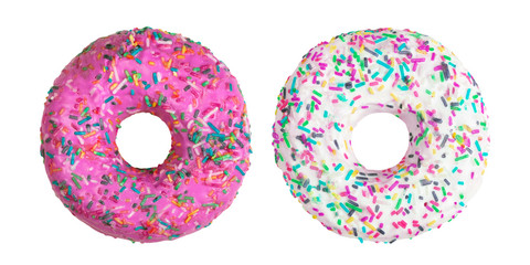 Two pink and white donuts decorated with colorful sprinkles isolated on white background. Flat lay. Top view