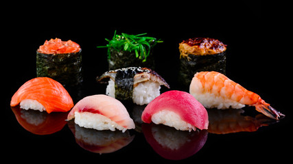 set nigiri on a black background