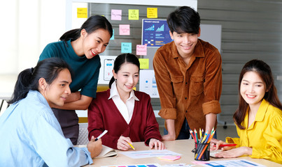 Wall Mural - brainstorm planing creative asian teamwork, group of asia mobile phone app developer team meeting fo