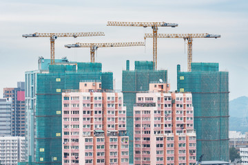 Construction site and high rise residential building in Hong Kong city