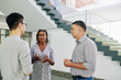 © DragonImages - Hispanic young businesswoman telling her creative innovative idea to coworkers