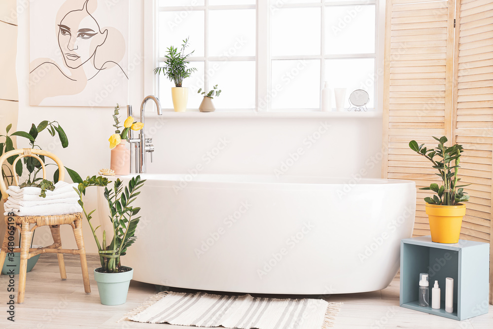 Interior of bathroom with floral decor