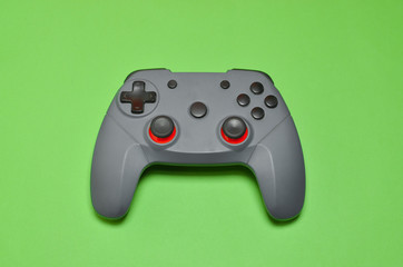 game controller on green background