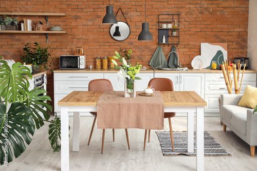 Fotomural Interior of modern stylish dining room with floral decor