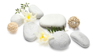 Composition with spa stones on white background