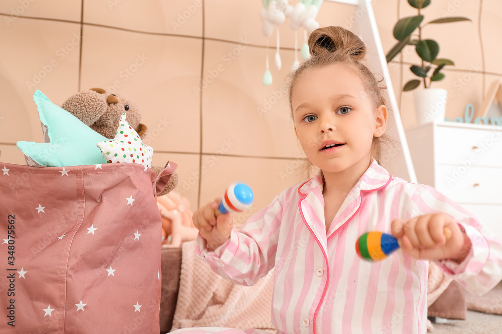 Little girl playing at home