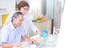 © ftgstudio - Asian happy senior man using computer for shopping online at home with basket flat icon hologram, senior people with internet technology concept, banner size