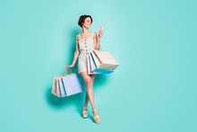 Full Length Body Size View Of Her She Nice Attractive Pretty Cheerful Cheery Girl Carrying New Brandy Things Bag Clothes Using Cell Isolated On Bright Vivid Shine Vibrant Blue Color Background