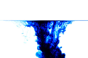 Blue ink drop in water. Background,Water drop collision with abstract effect.Blue ink isolated in water