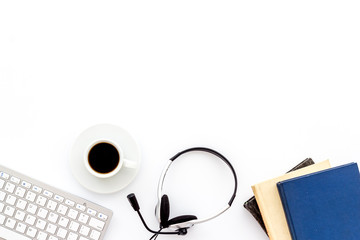 Poster - Office workplace. Headphones, keyboard, notebook on white desk top-down copy space