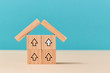 © oleg_chumakov - Prices increase. Real estate. Property purchase or rent. Wooden cube with arrows up. Blocks as roof on blue. Copy space